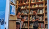Children choosing books at the Fair Oaks LIbrary